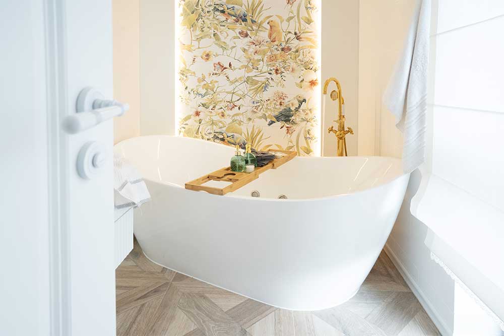 luxurious bathroom with stand alone tub